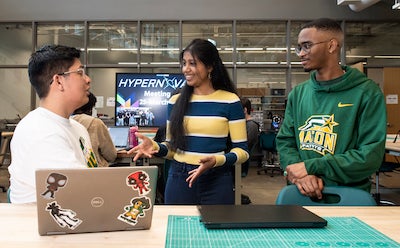 students at work in the mix
